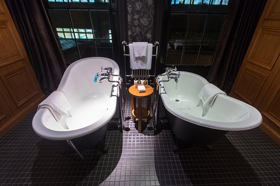 Matching cast iron baths in the Hotel du Vin Cambridge's Wolfbass Suite
